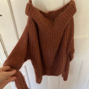 Mauve fuzzy off shoulder sweater.